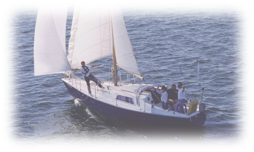 A group of people on a sailboat in the water

Description automatically generated with medium confidence